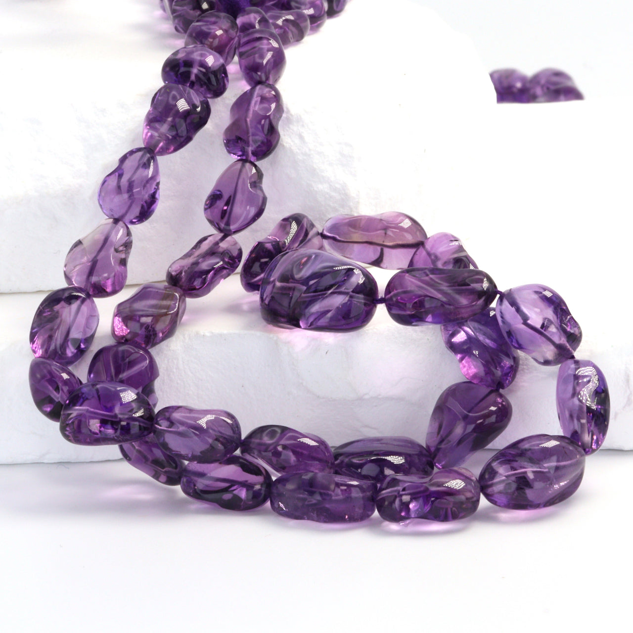 Purple Amethyst 10x8mm - 11x9mm Smooth Nuggets Bead Strand