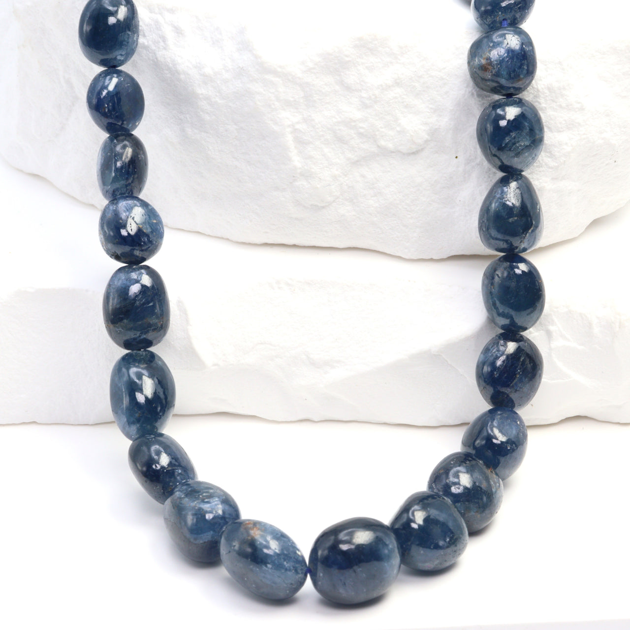Blue Sapphire 6x8mm - 8x10mm Smooth Ovals Bead Strand