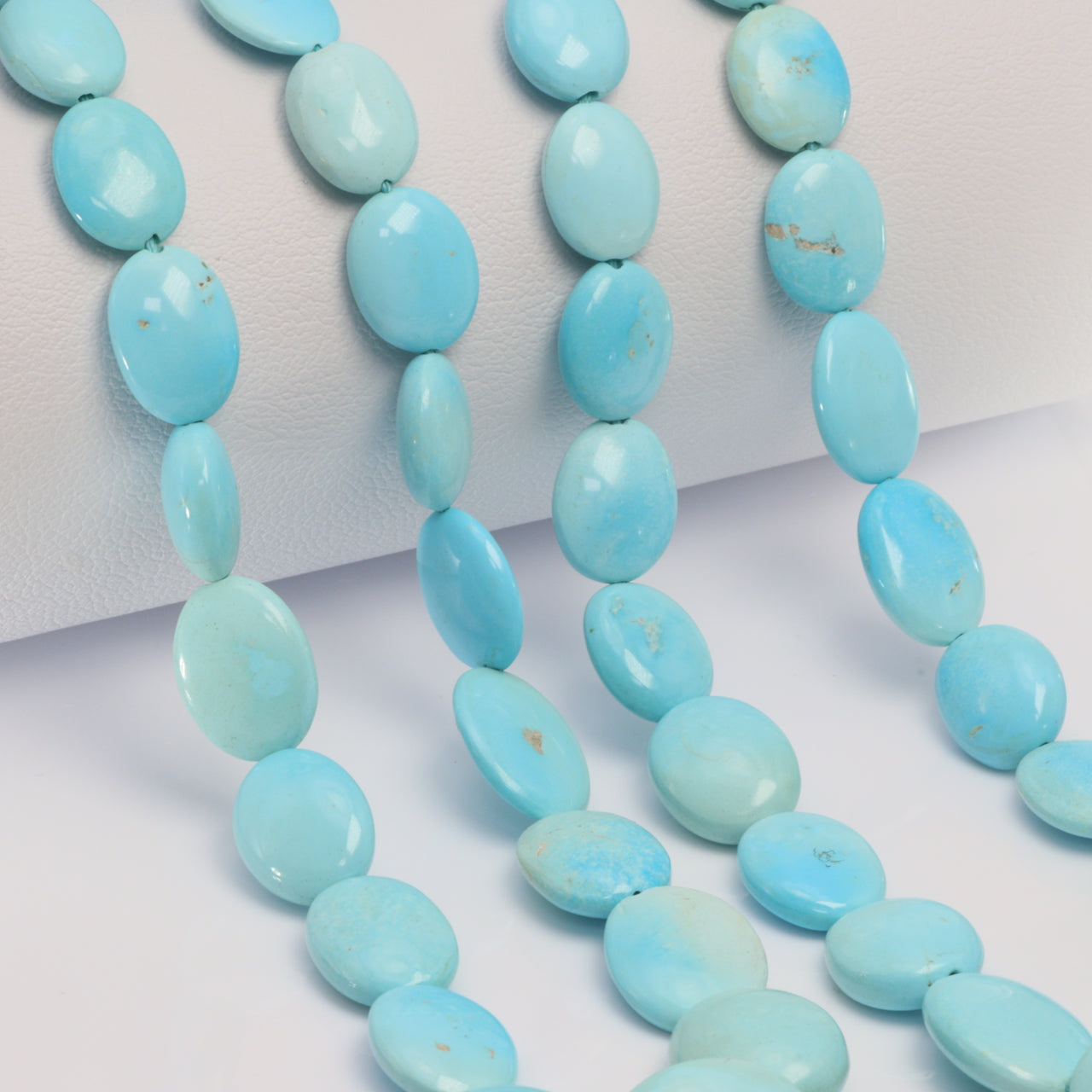 AAA Light Blue Turquoise 7x5mm - 12x10mm Smooth Ovals Bead Strand