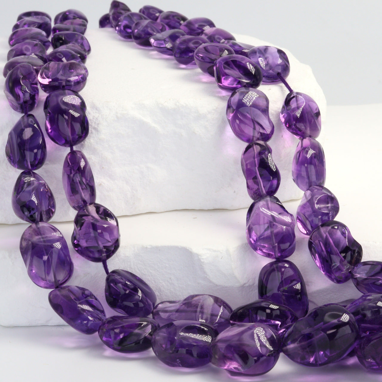 AA Purple Amethyst 10x8mm - 14x10mm Smooth Nuggets Bead Strand