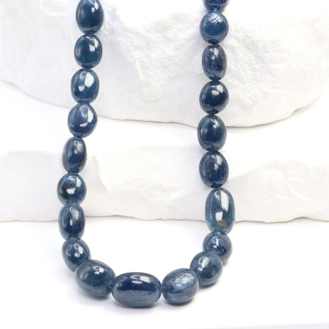 Blue Sapphire 5x7mm - 6x8mm Smooth Nuggets Bead Strand