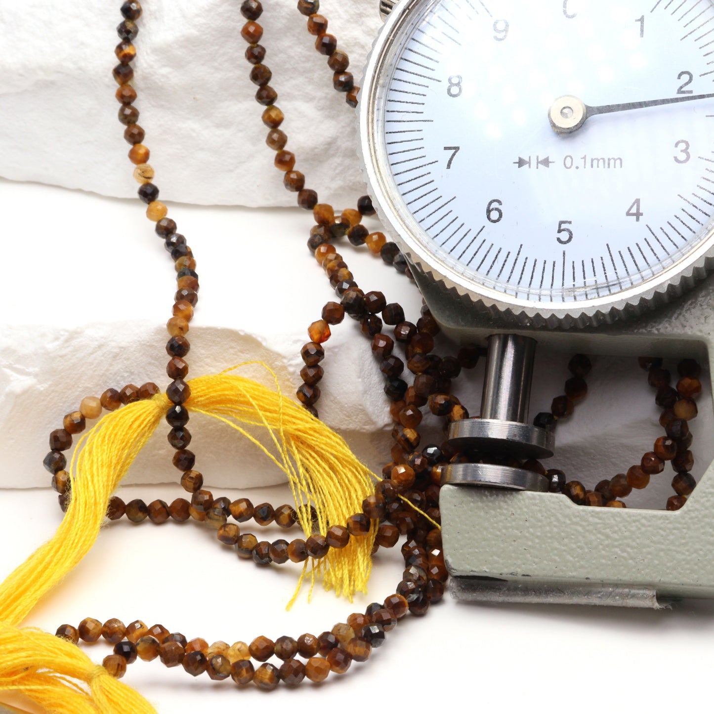 Tiger's Eye 2mm Faceted Rounds