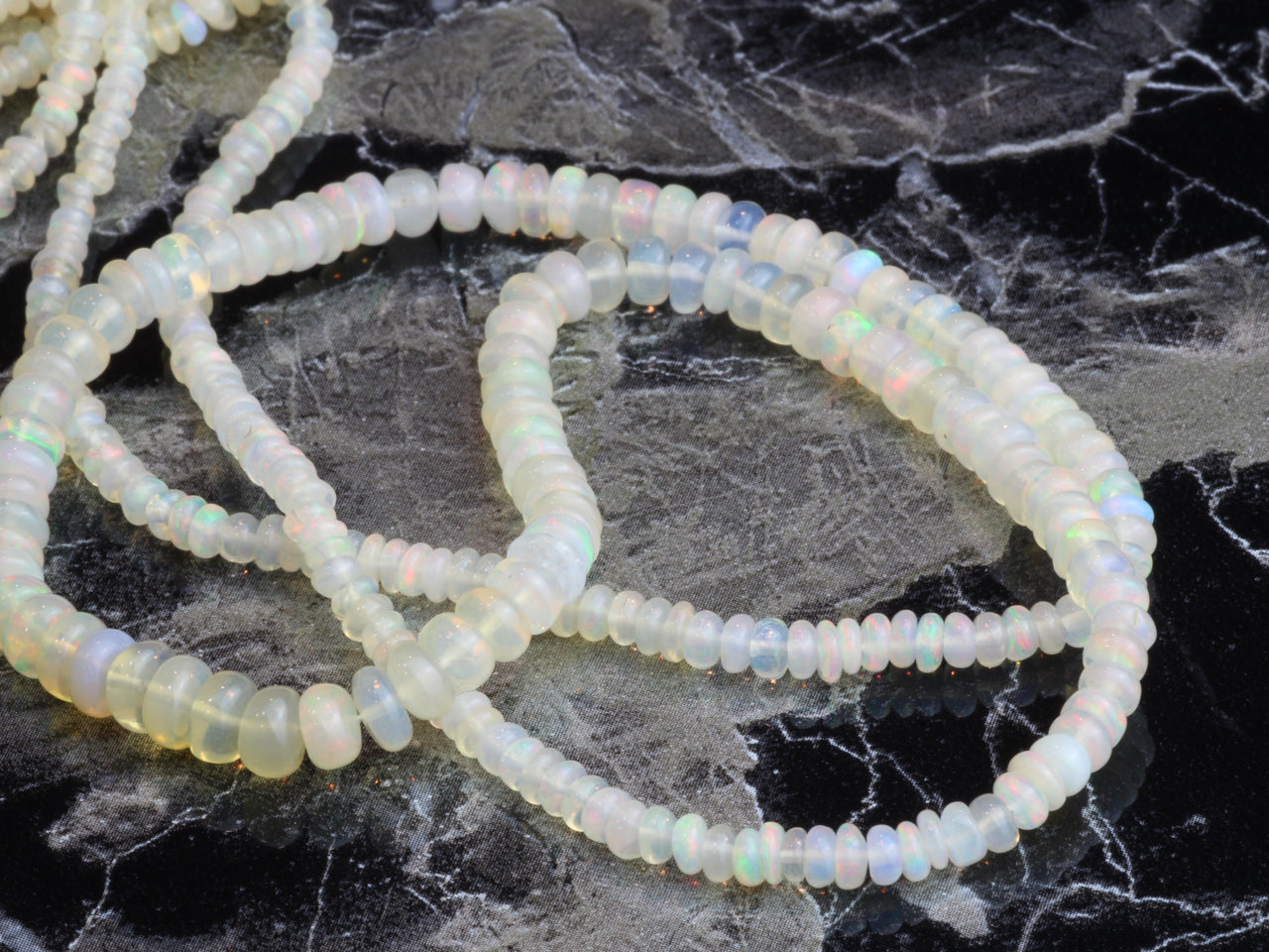 White Ethiopian Opal 3mm - 4.5mm Smooth Rondelles Bead Strand