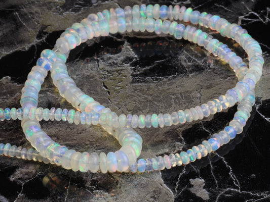 White Ethiopian Opal 3mm - 5mm Smooth Rondelles Bead Strand