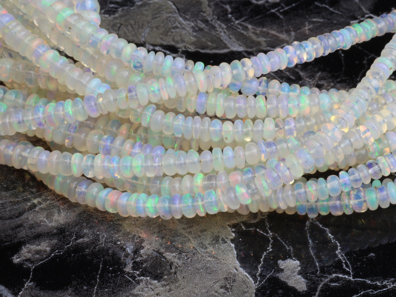 White Ethiopian Opal 3mm - 5mm Smooth Rondelles Bead Strand