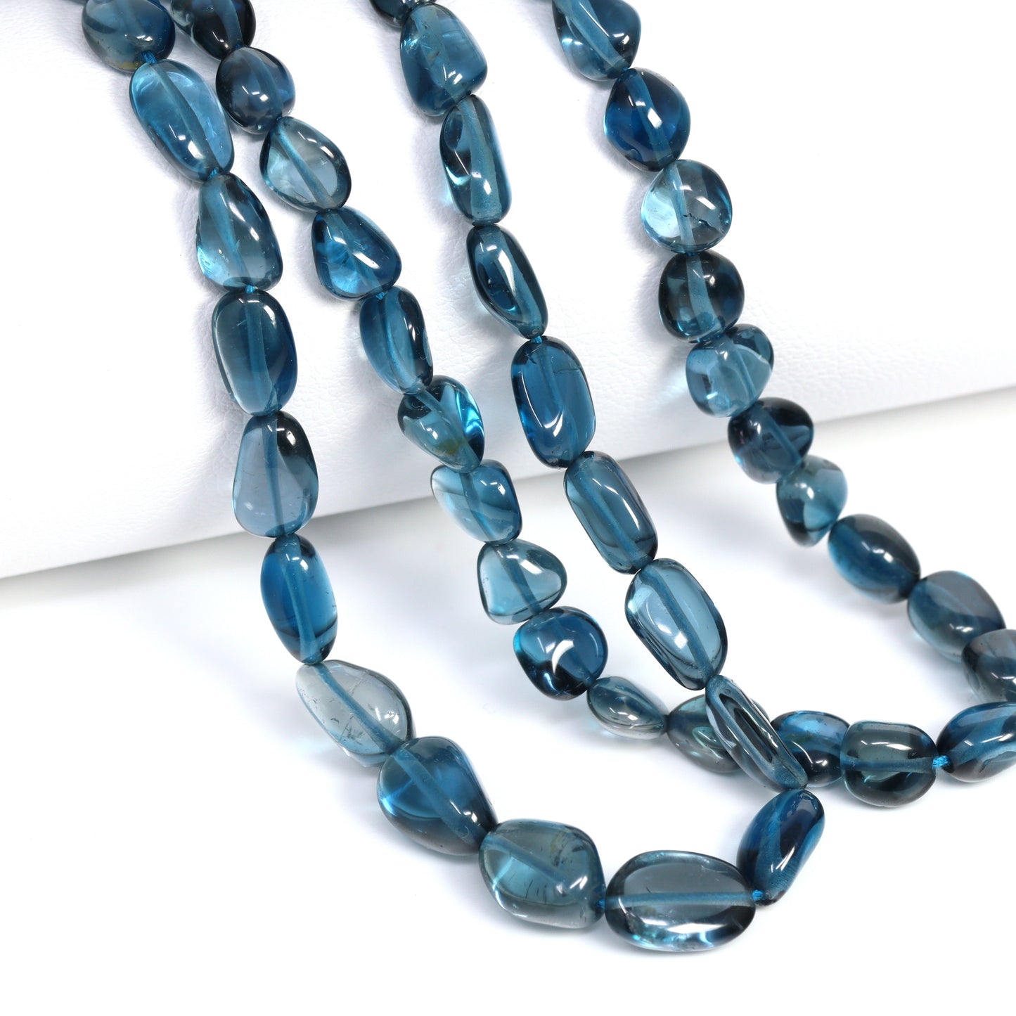 London Blue Topaz 6x4mm – 8x6mm Smooth Nuggets Bead Strand