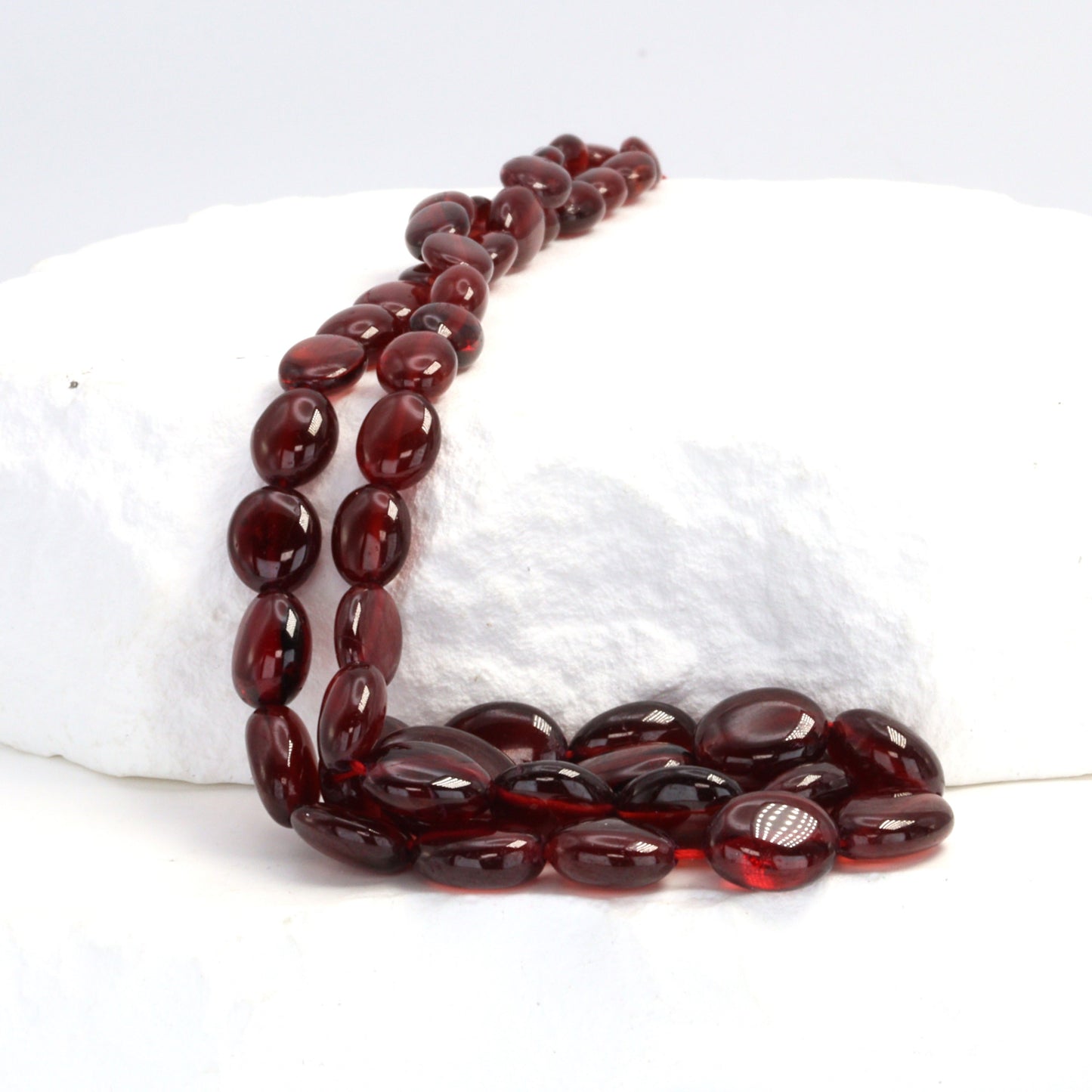 Red Garnet 6x4mm - 9x7mm Smooth Ovals Bead Strand