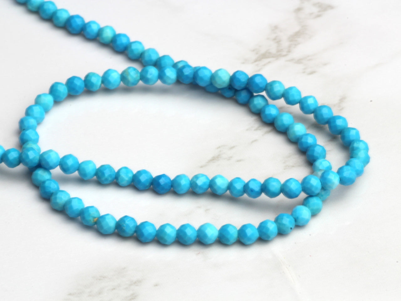 Blue Turquoise (R) 2.5mm Faceted Rounds