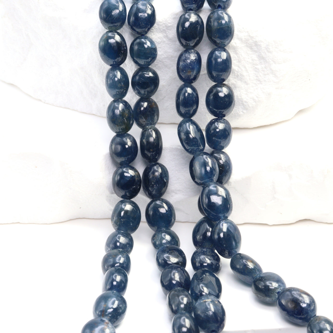 Blue Sapphire 5x7mm - 6x8mm Smooth Nuggets Bead Strand