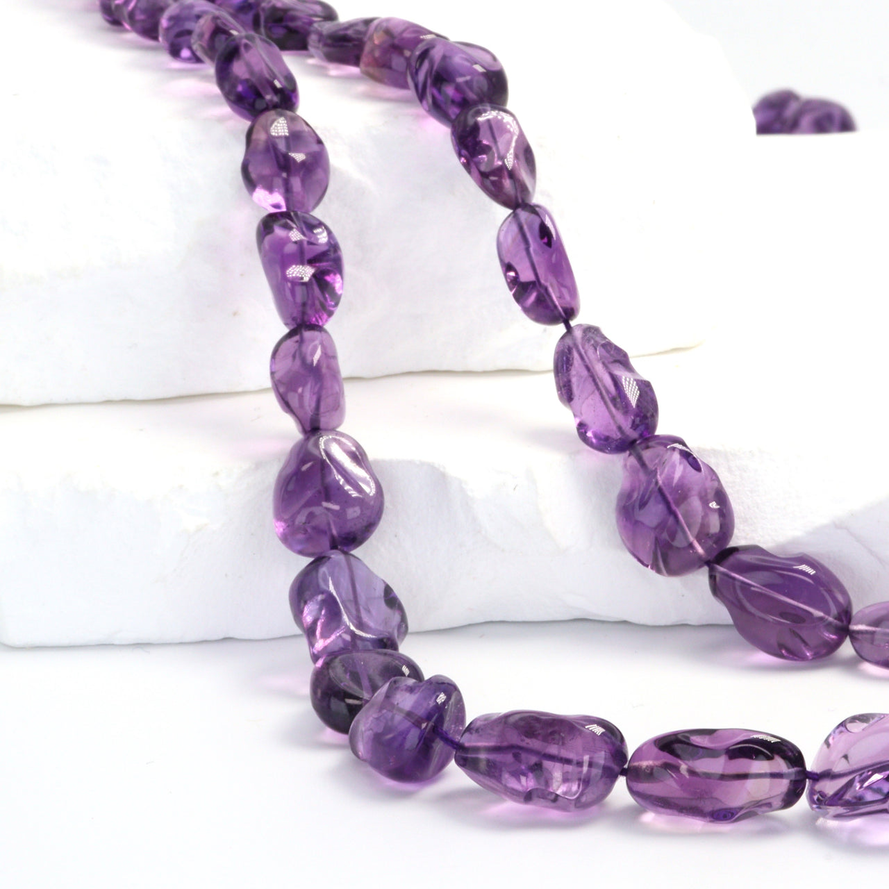 Purple Amethyst 10x8mm - 11x9mm Smooth Nuggets Bead Strand