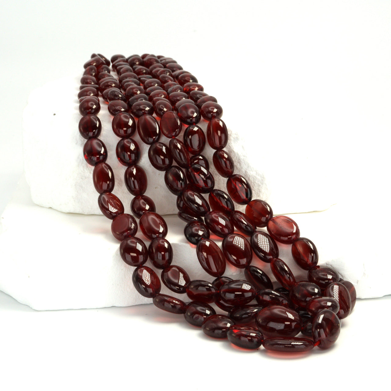 Red Garnet 6x4mm - 9x7mm Smooth Ovals Bead Strand