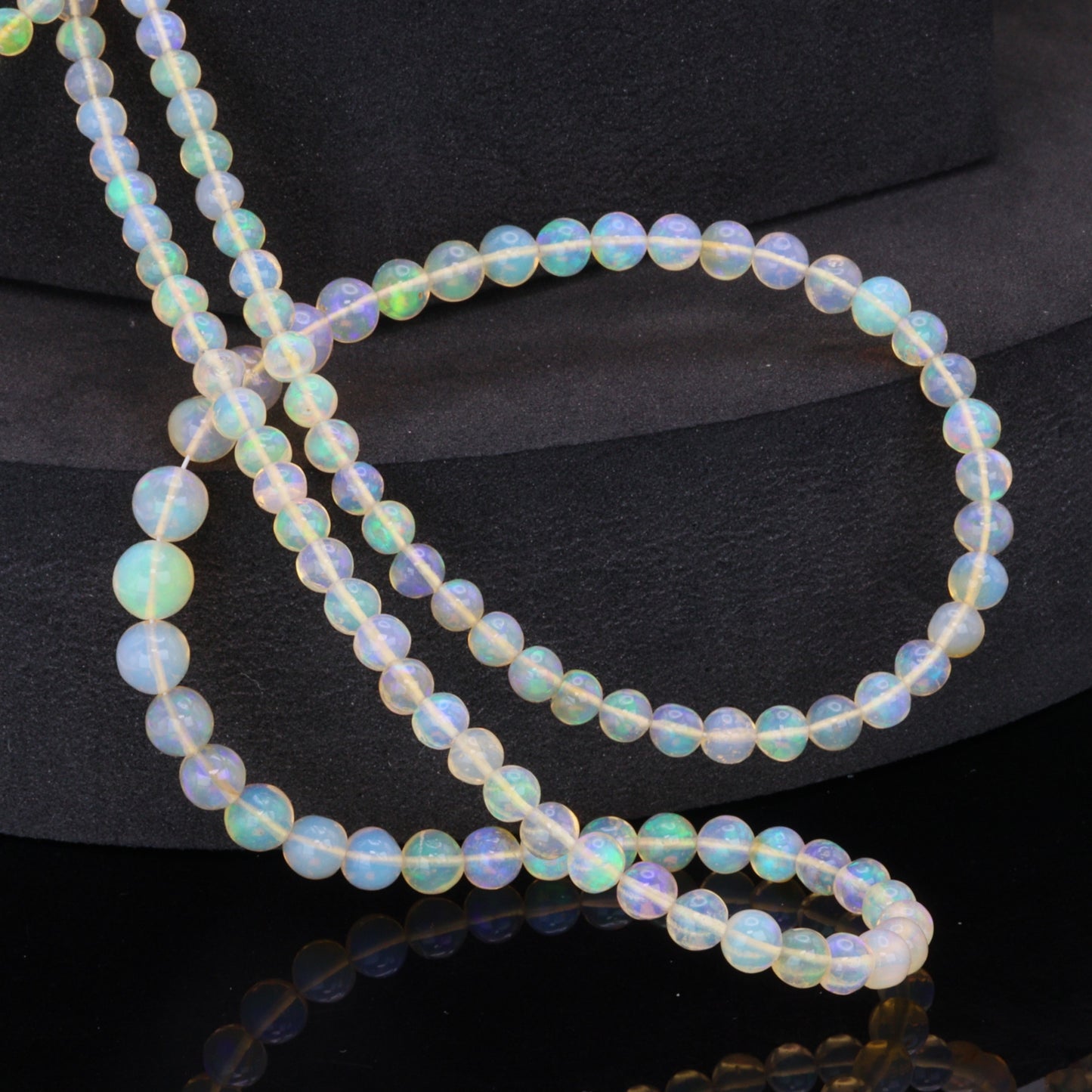 Yellow Ethiopian Opal 4mm - 5.5mm Smooth Rounds Bead Strand