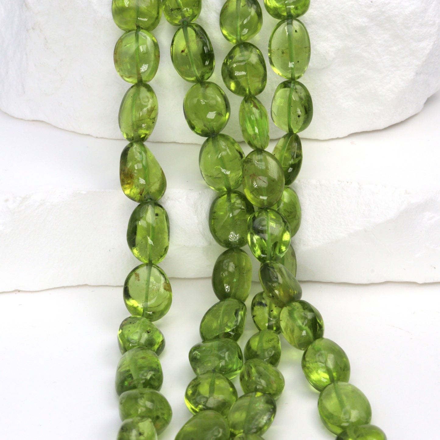 AA Green Peridot 9x7mm - 10x8mm Smooth Nuggets Bead Strand