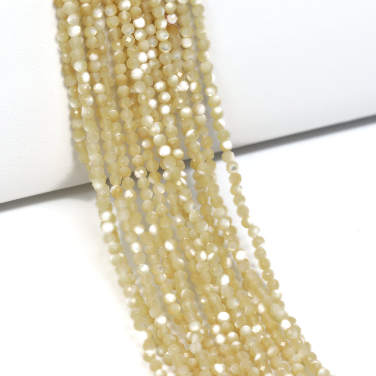Natural Mother of Pearl 2mm Faceted Rounds Bead Strand