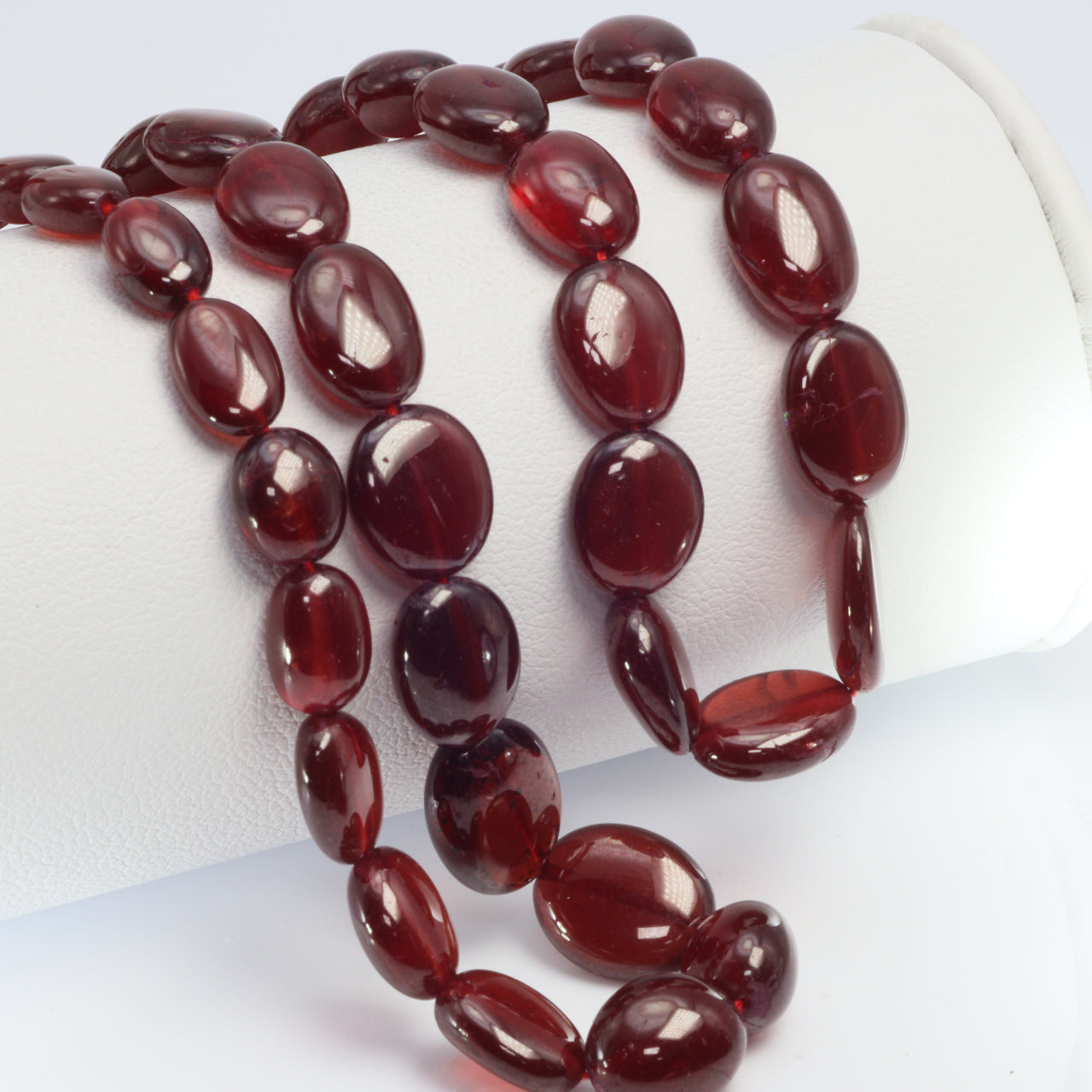 Red Garnet 6x4mm - 9x7mm Smooth Ovals Bead Strand
