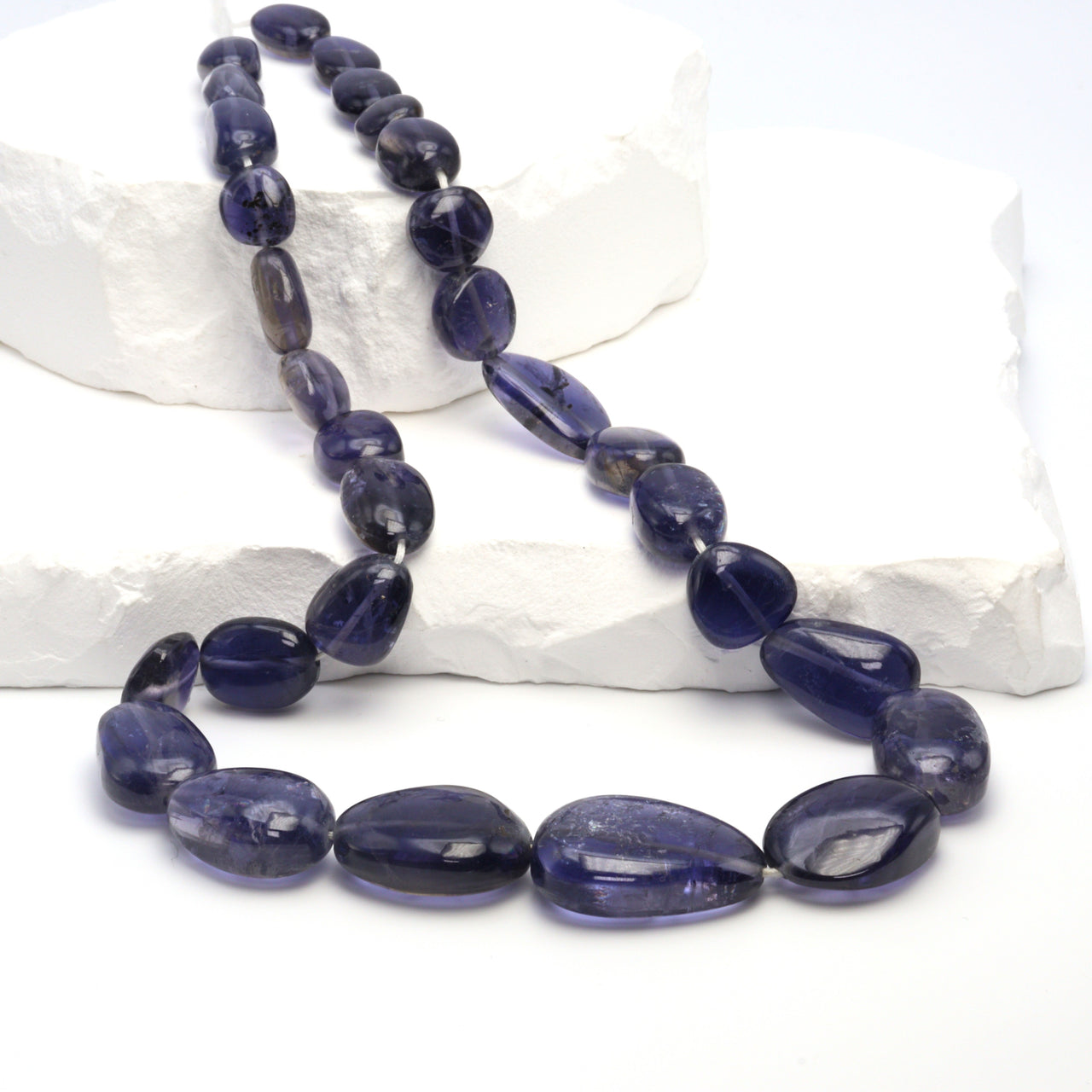 Blue Iolite 20x10mm - 25x15mm Smooth Ovals Bead Strand