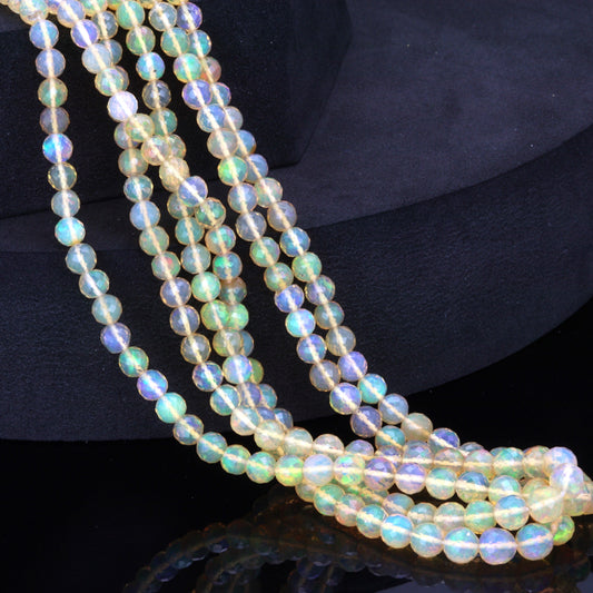 Yellow Ethiopian Opal 4mm - 5mm Hand Faceted Rounds Bead Strand