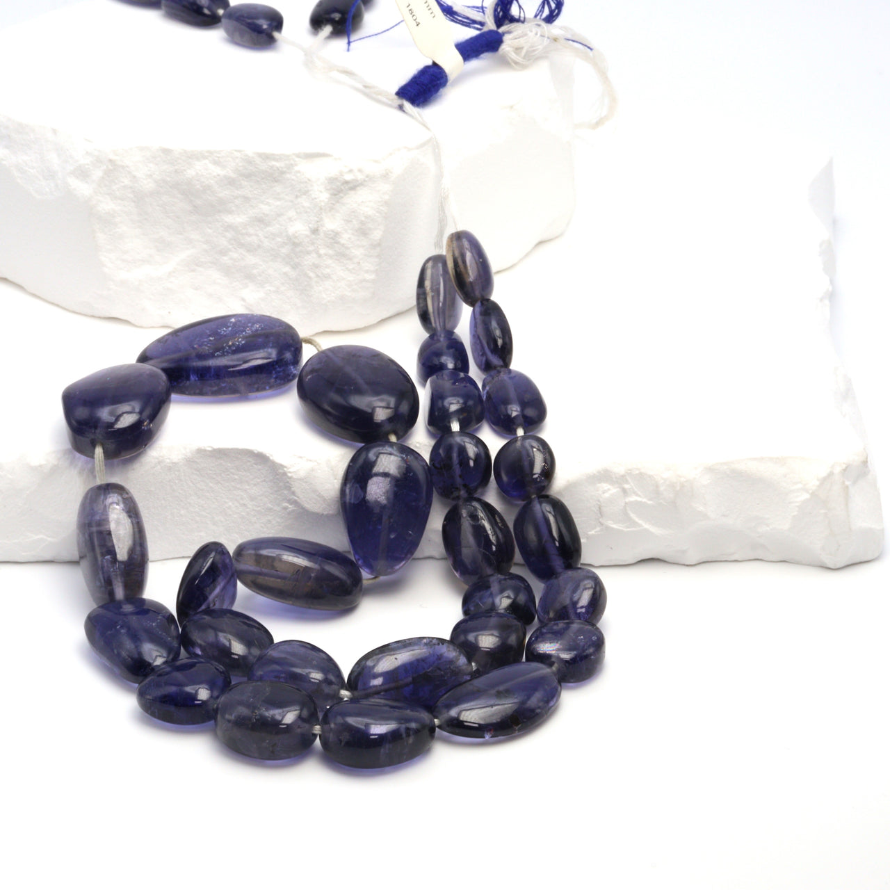 Blue Iolite 20x10mm - 25x15mm Smooth Ovals Bead Strand