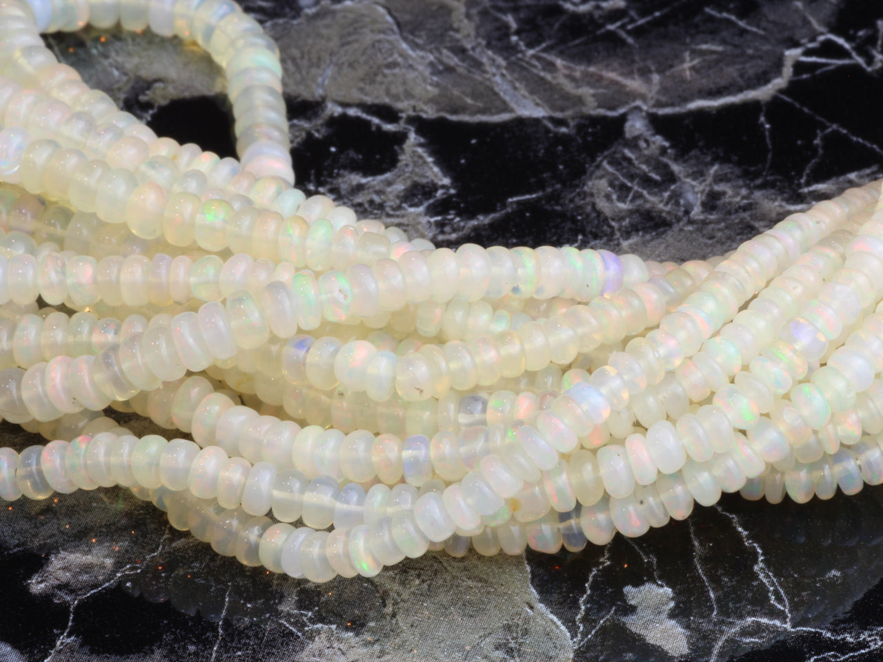 White Ethiopian Opal 3mm - 4.5mm Smooth Rondelles Bead Strand