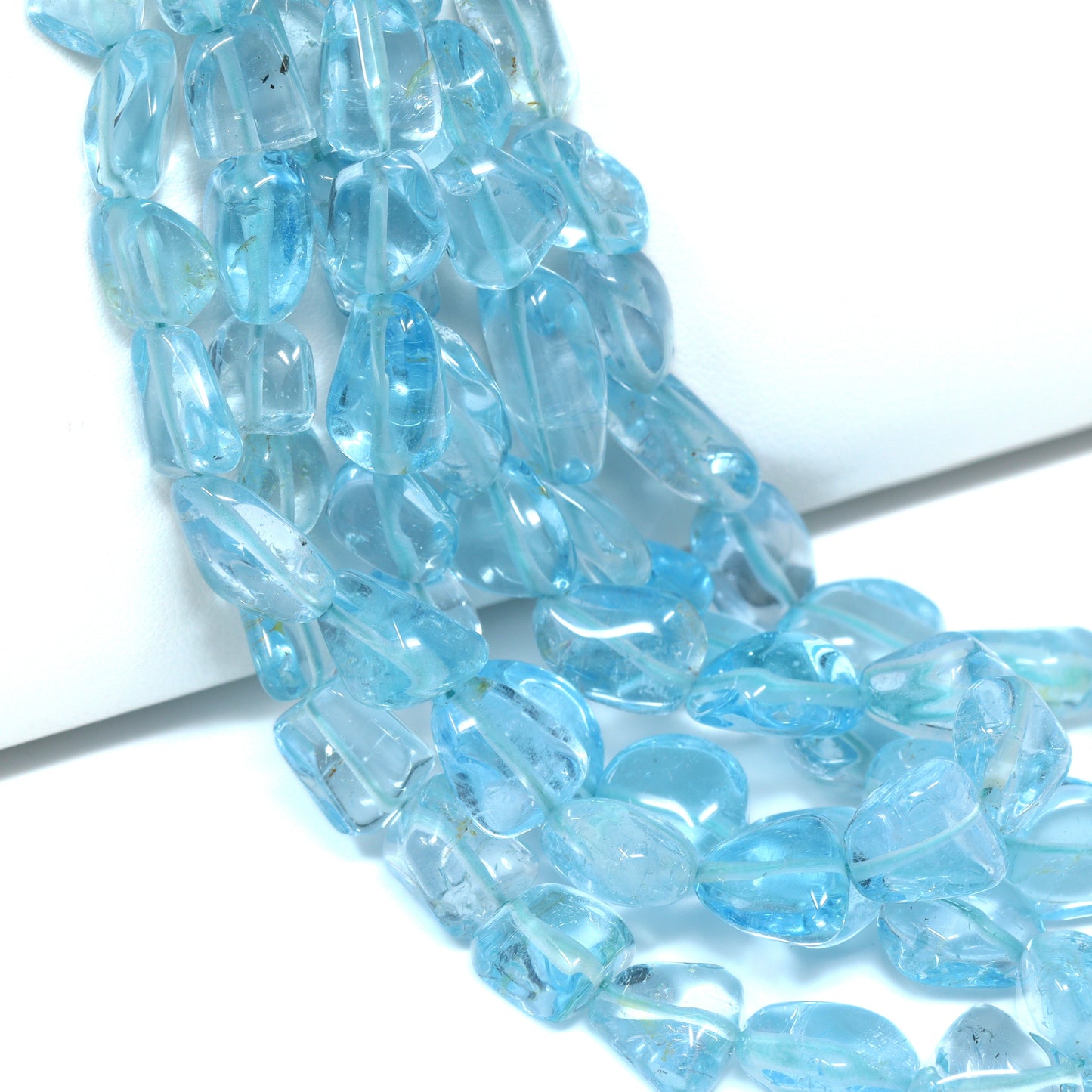 Sky Blue Topaz 9x6mm – 12x10mm Smooth Nuggets Bead Strand