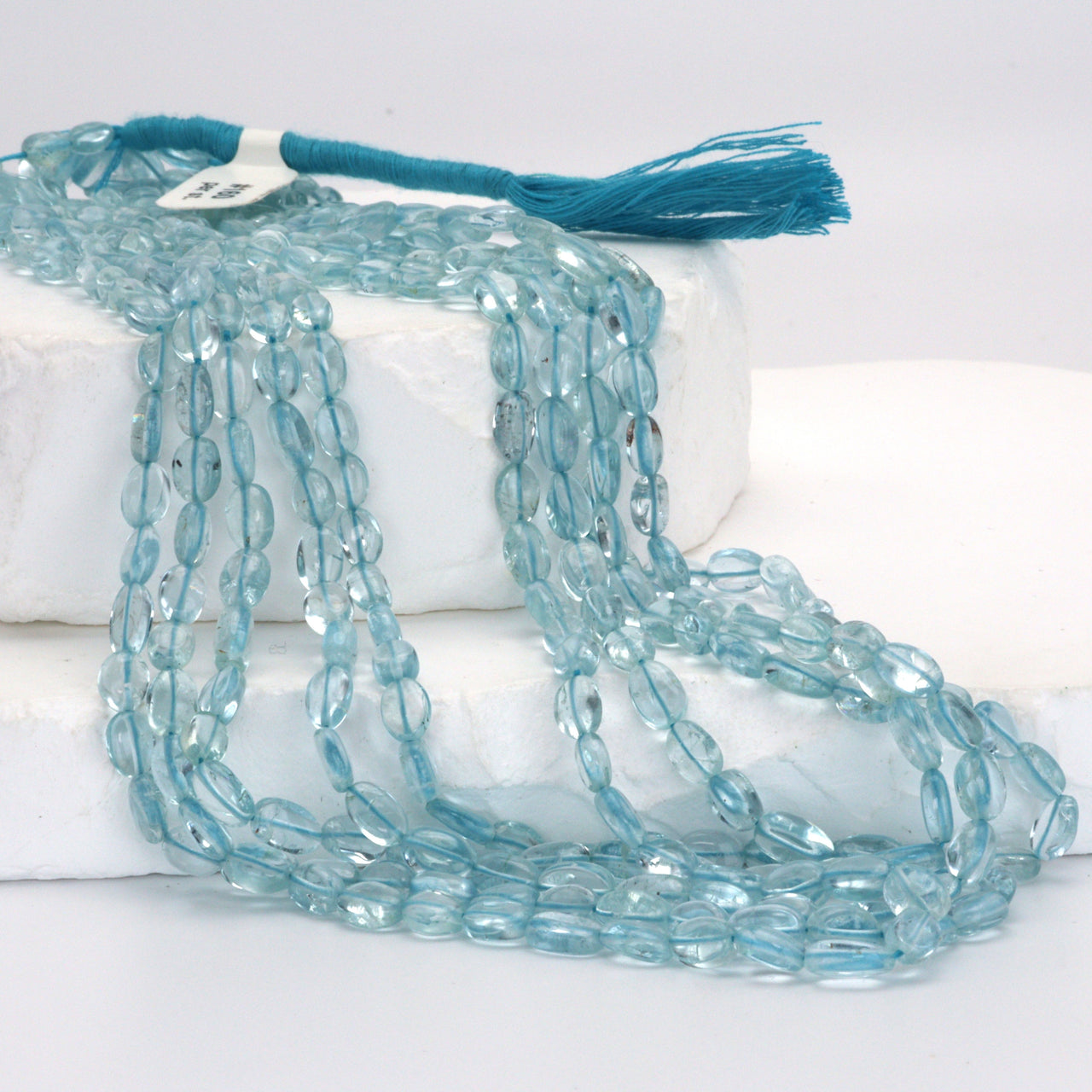 Blue Aquamarine 6x4mm - 7x5mm Smooth Ovals Bead Strand