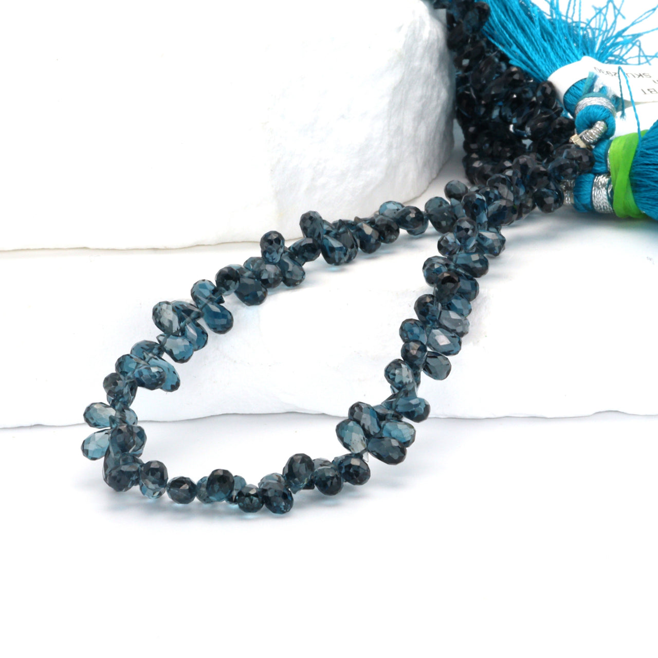 AA London Blue Topaz 4x6mm Faceted Teardrop Briolettes Bead Strand