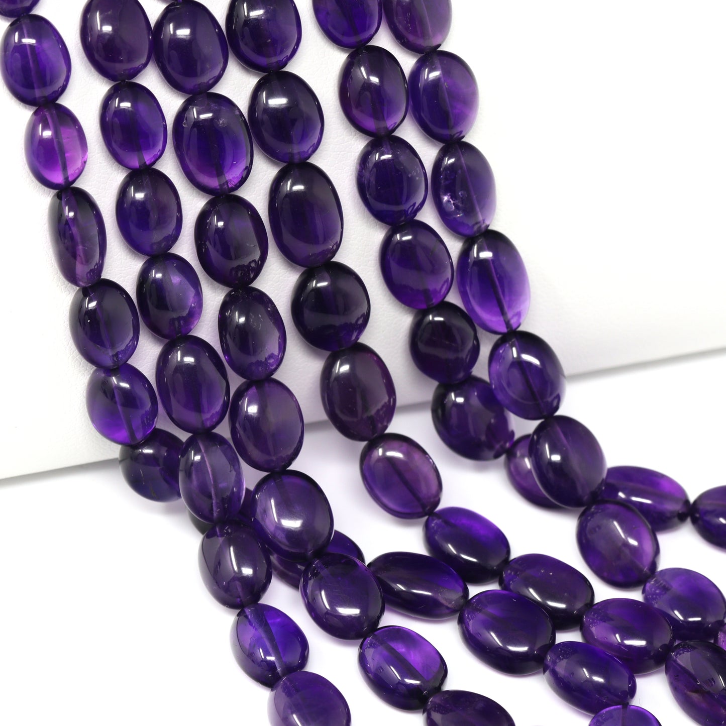 Purple Amethyst 9x7mm – 12x10mm Smooth Ovals Bead Strand