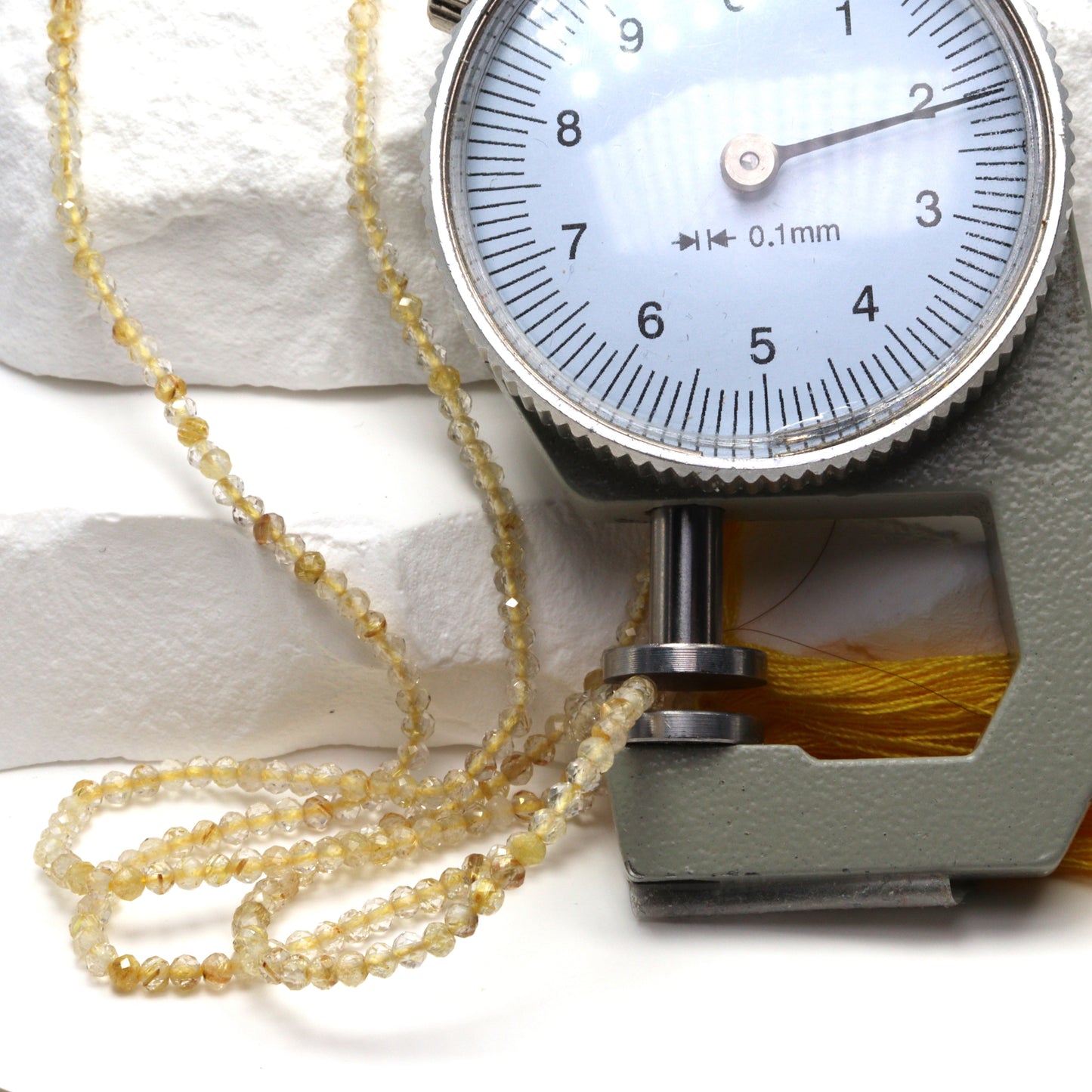 Golden Rutilated Quartz 2mm Faceted Rounds