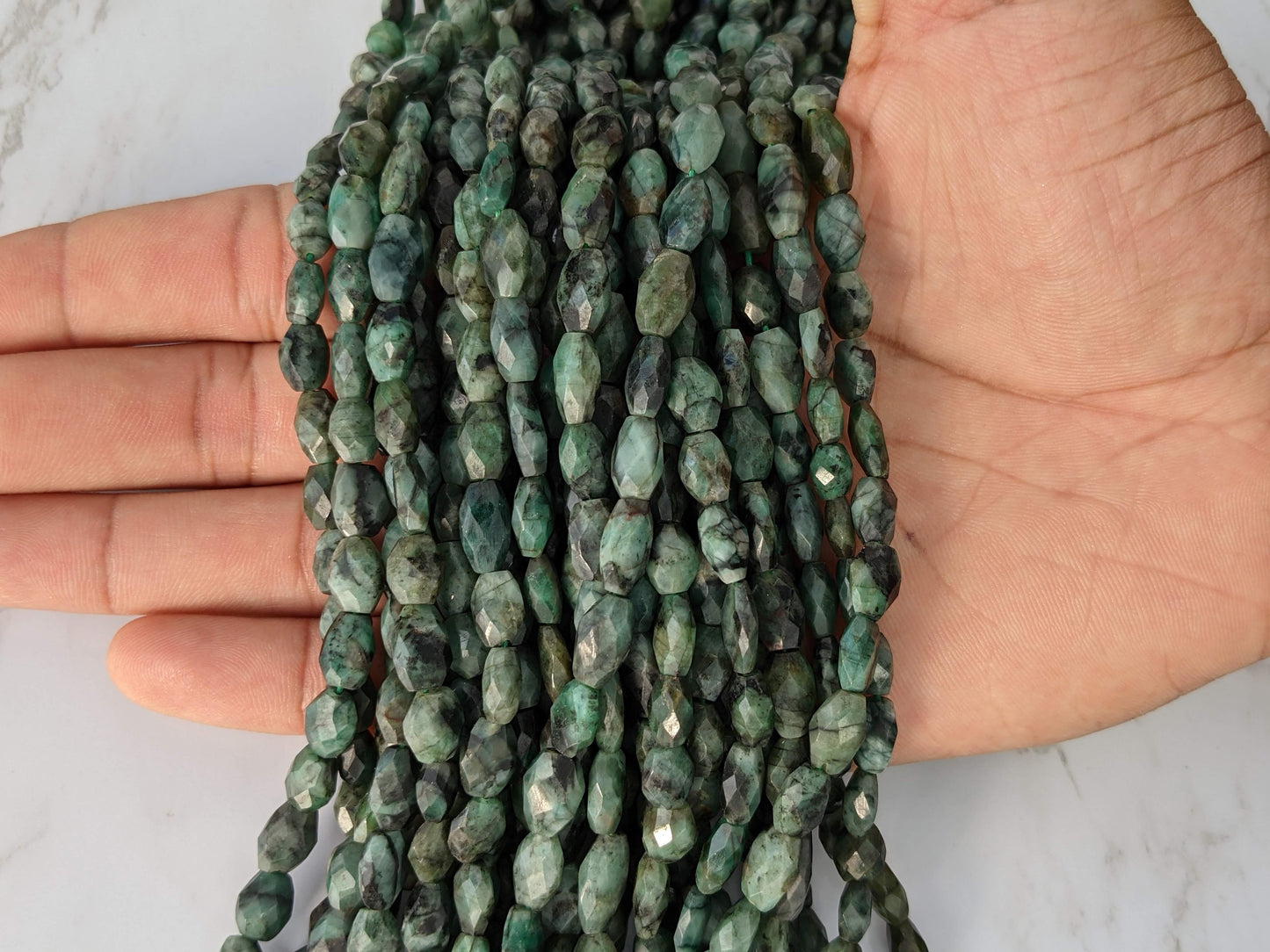 Sakoda Emerald 9x7mm Faceted Ovals