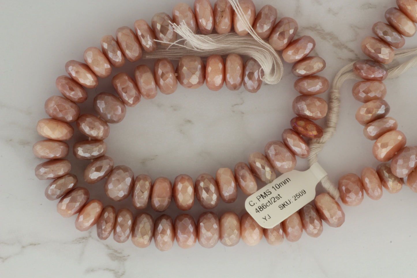Coated Peach Moonstone 10mm Faceted Rondelles