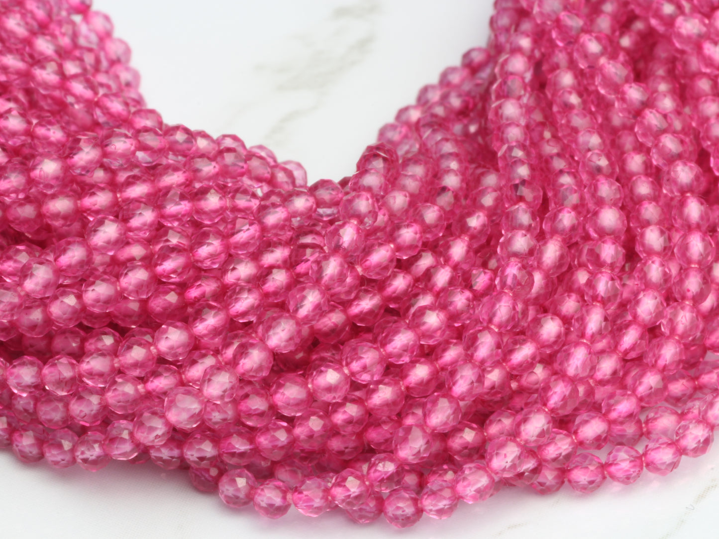 Coated Pink Quartz 2.5mm Faceted Rounds