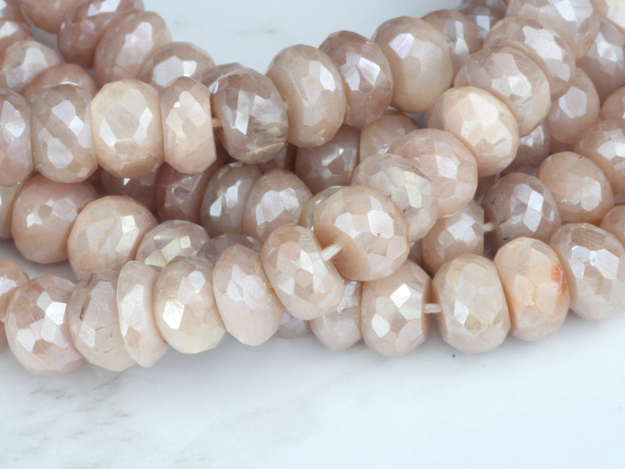 Coated Peach Moonstone 7mm Faceted Rondelles