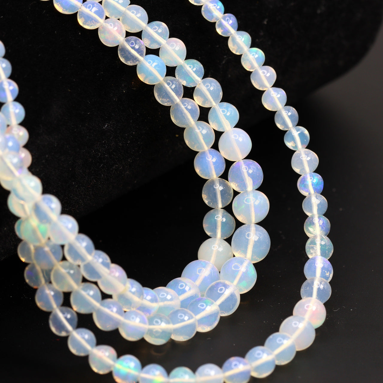 White Ethiopian Opal 3.5mm - 6mm Smooth Rounds Bead Strand