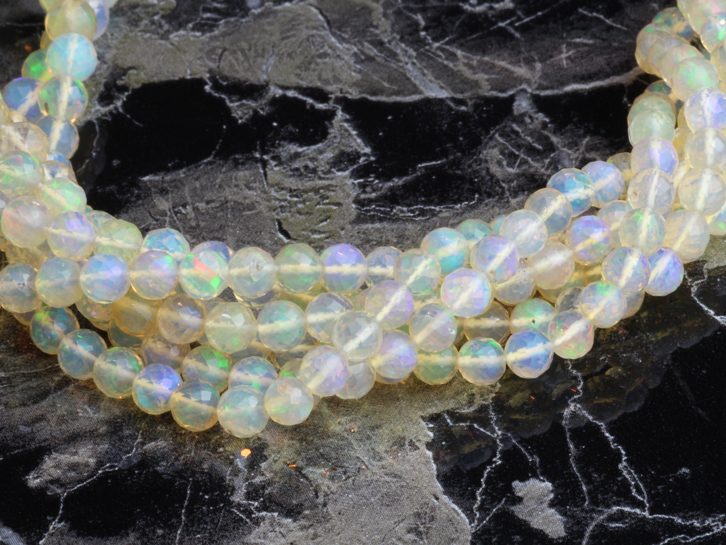 Warm White Ethiopian Opal 4mm Faceted Rounds