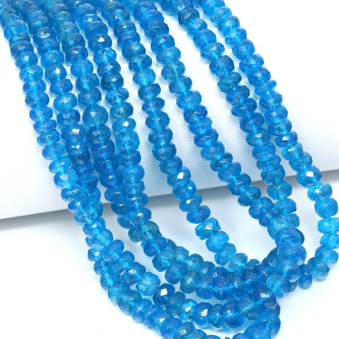 Neon Blue Apatite 4mm – 5mm Hand Faceted Rondelles Bead Strand
