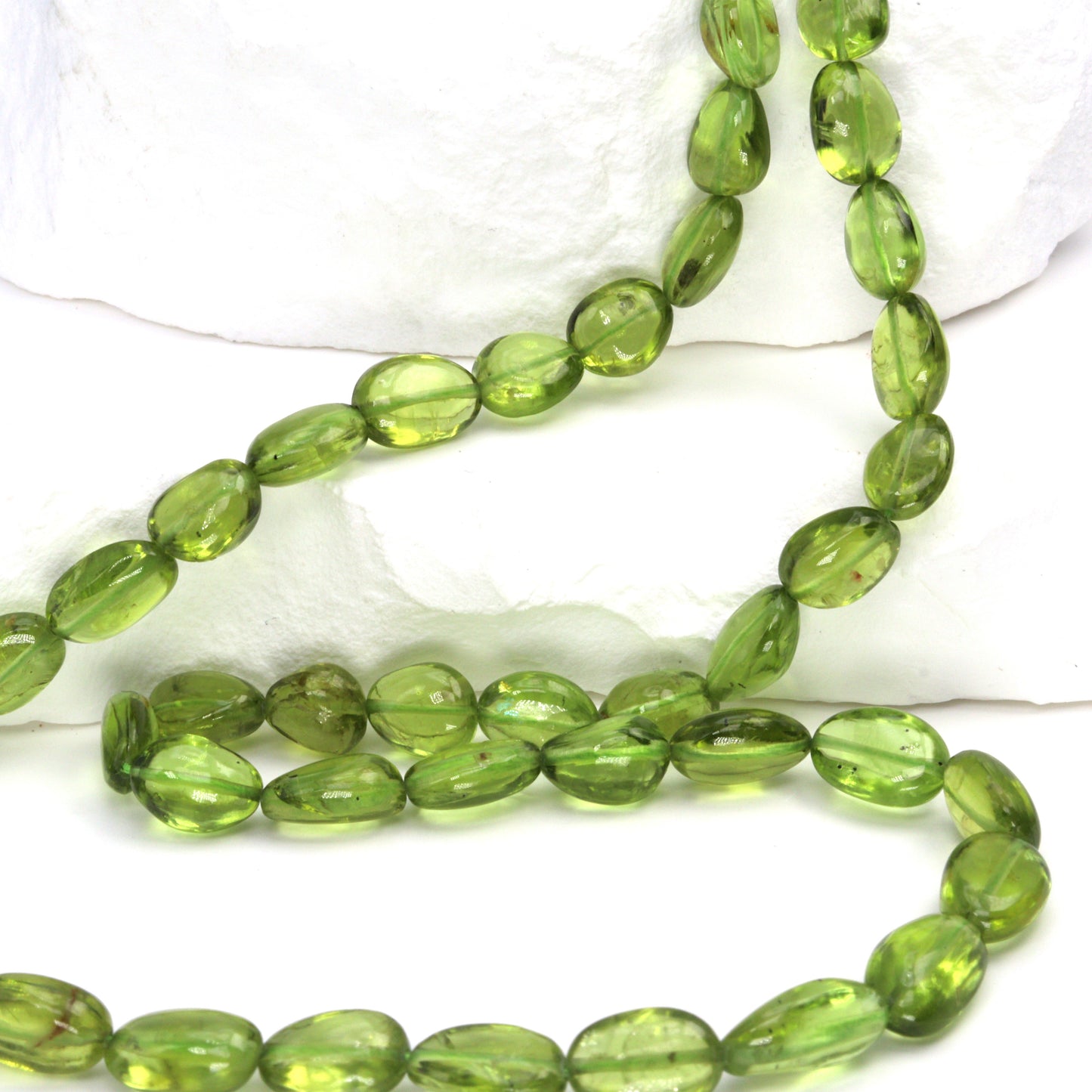 AA Green Peridot 8x6mm - 10x7mm Smooth Nuggets Bead Strand