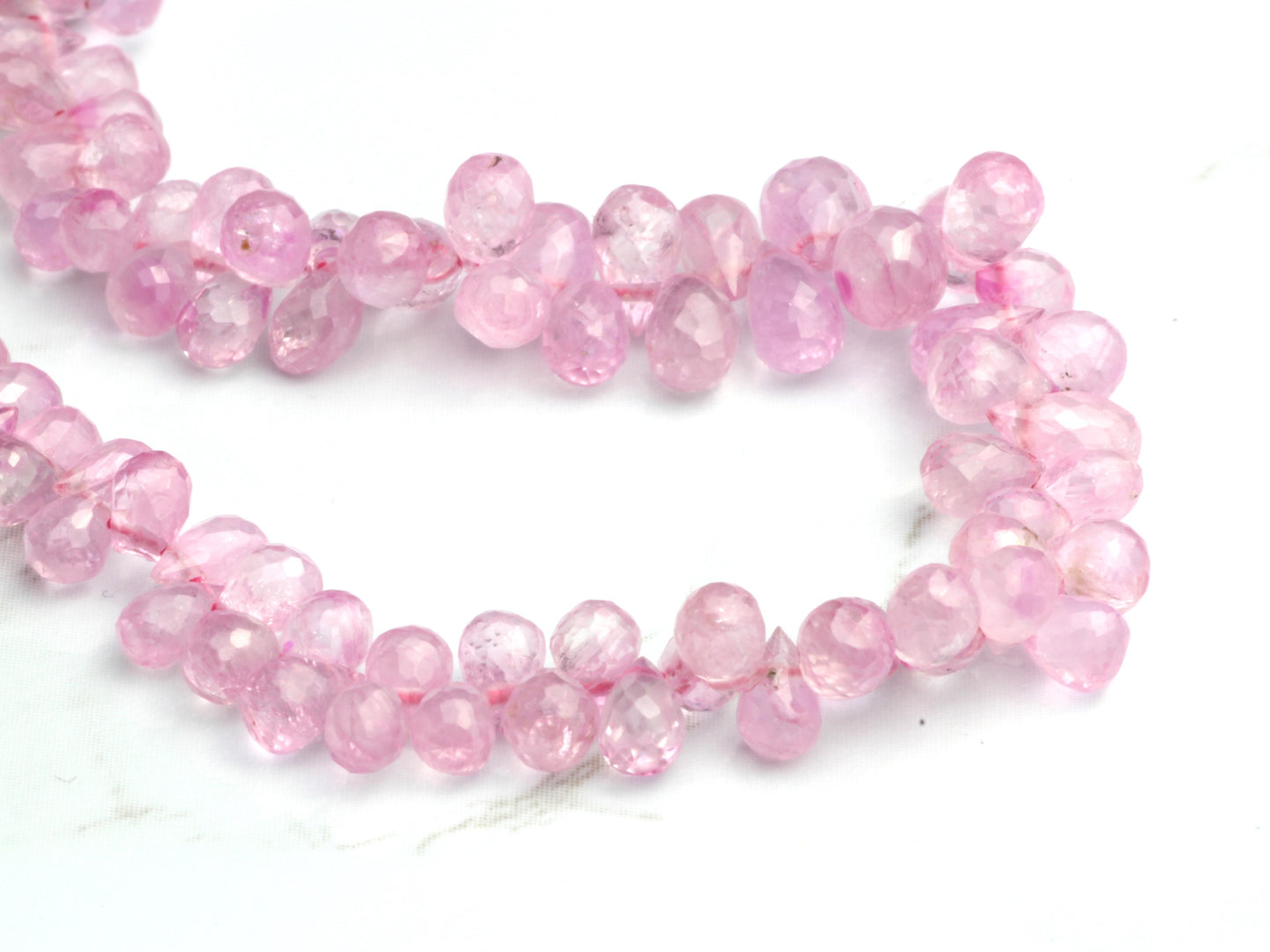 Light Pink Sapphire 5x3mm - 6x4mm Faceted Teardrop Briolettes Bead Strand