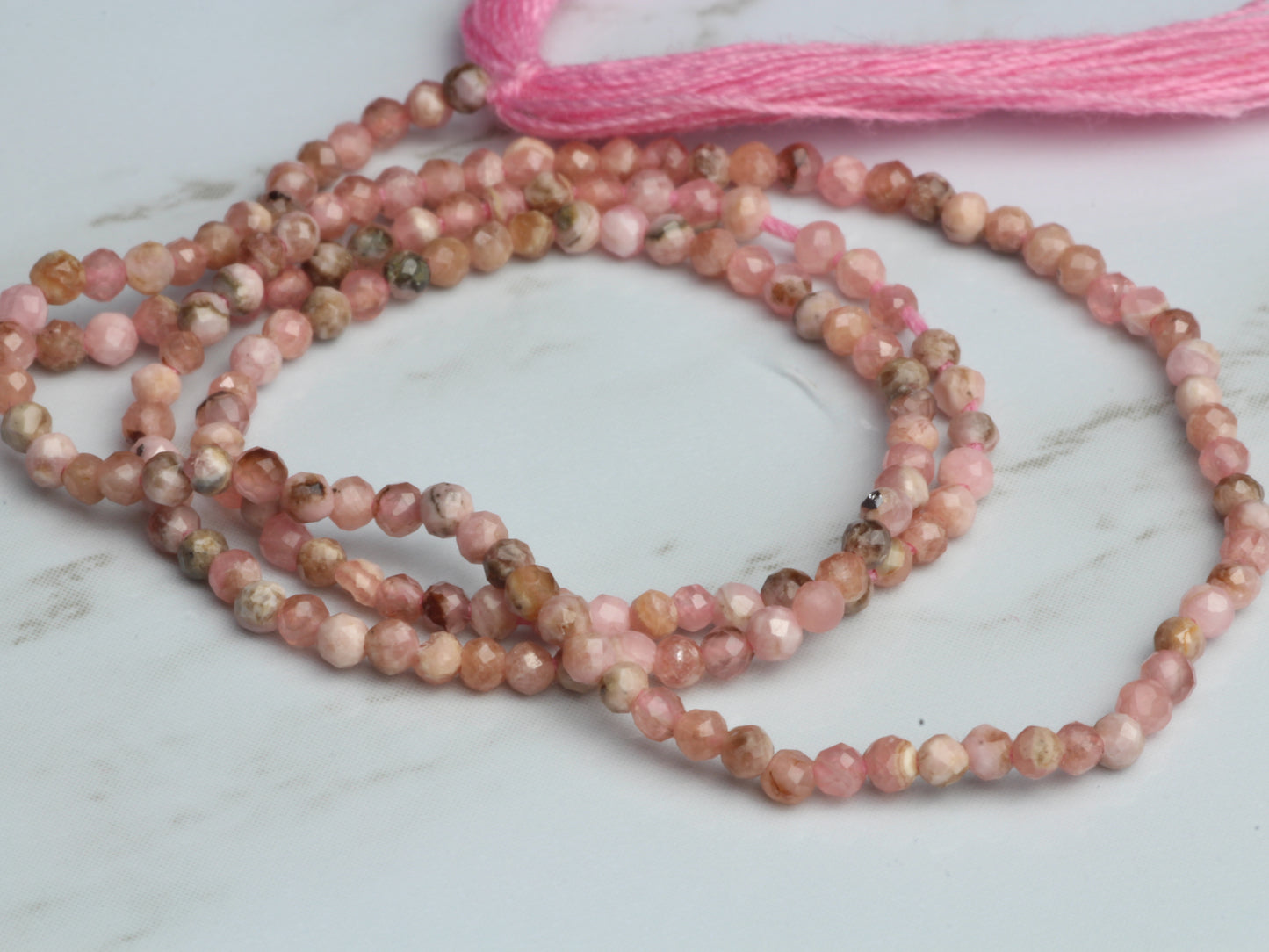 Pink Rhodochrosite 2mm Faceted Rounds