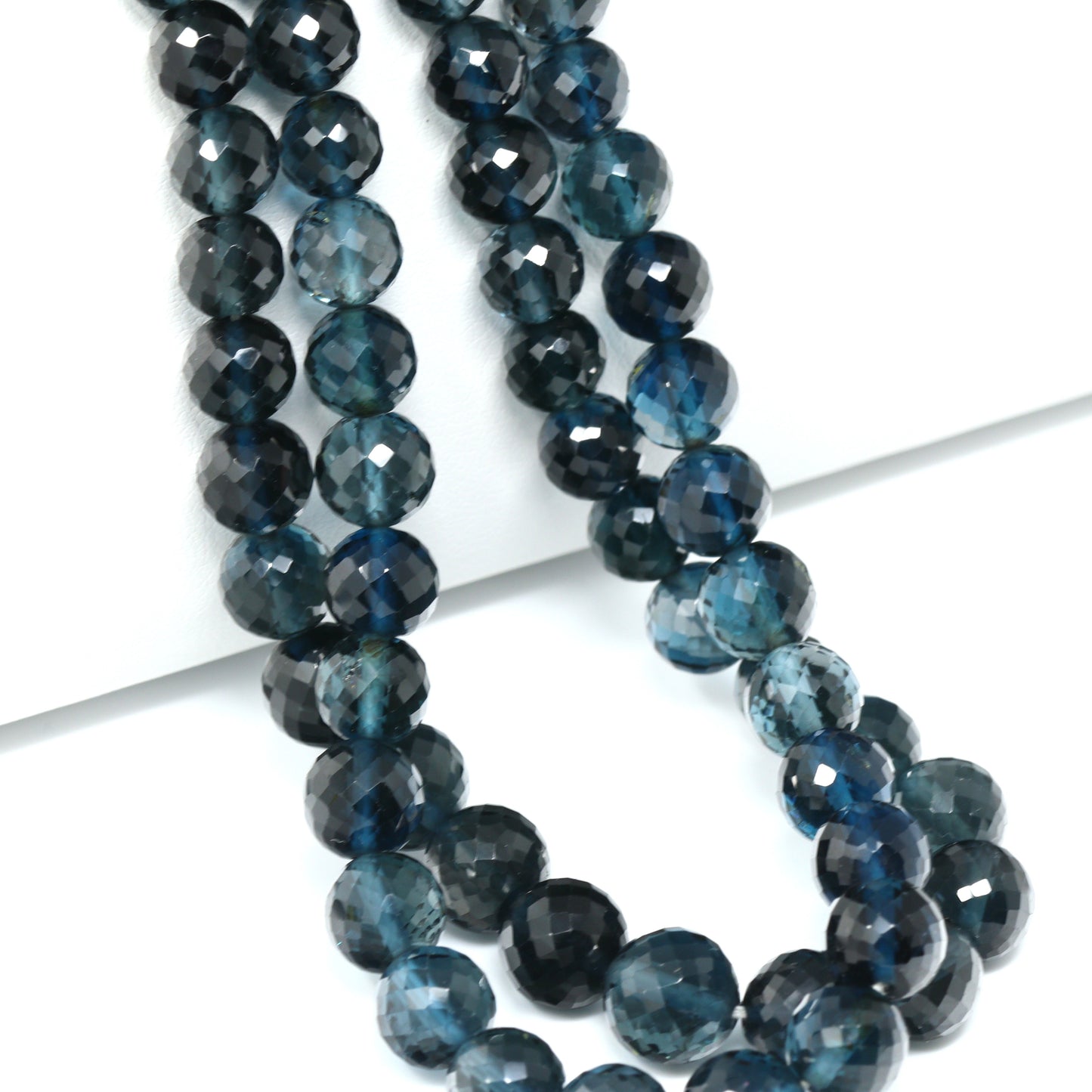 London Blue Topaz 6mm – 8mm Faceted Rounds Bead Strand