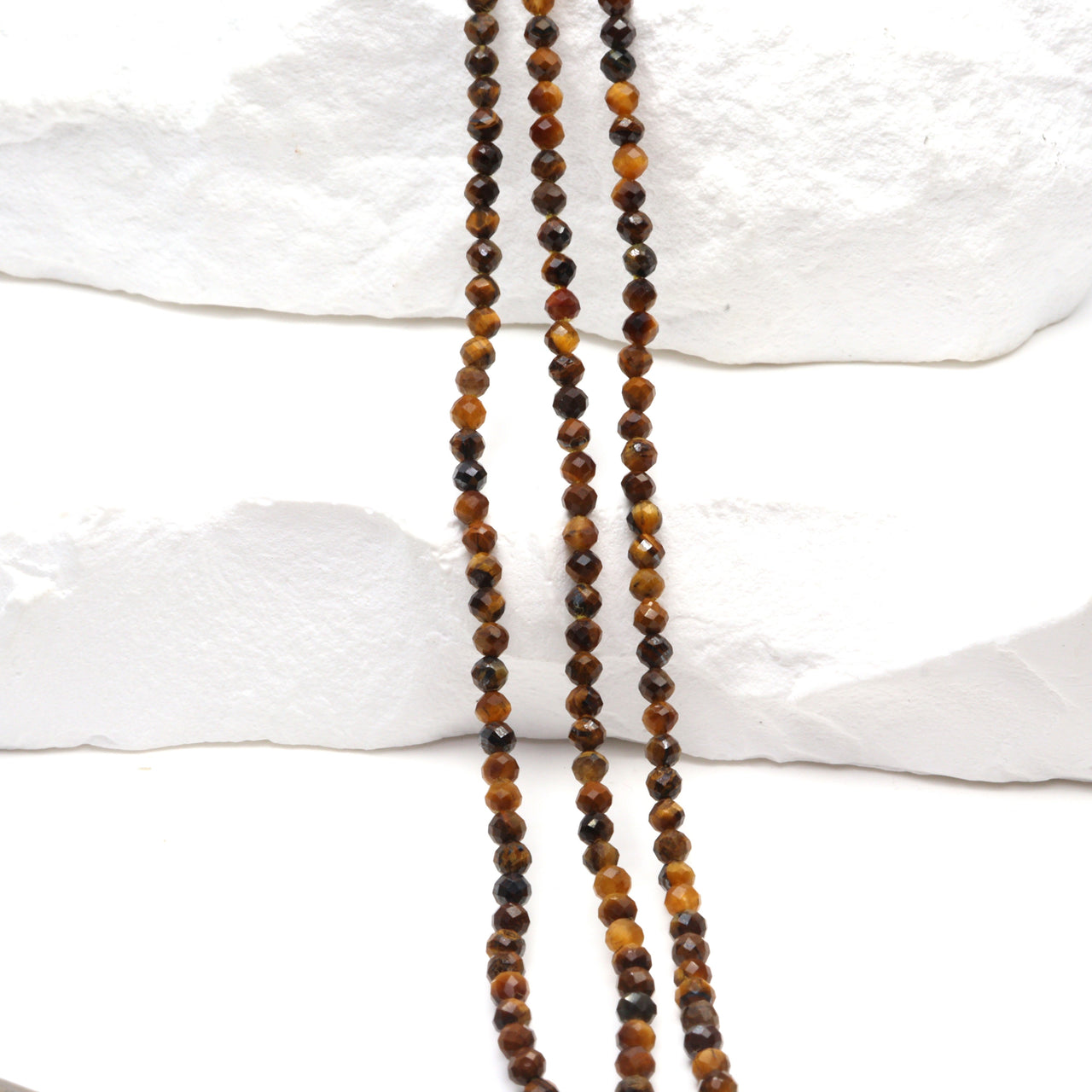 Tiger's Eye 2mm Faceted Rounds