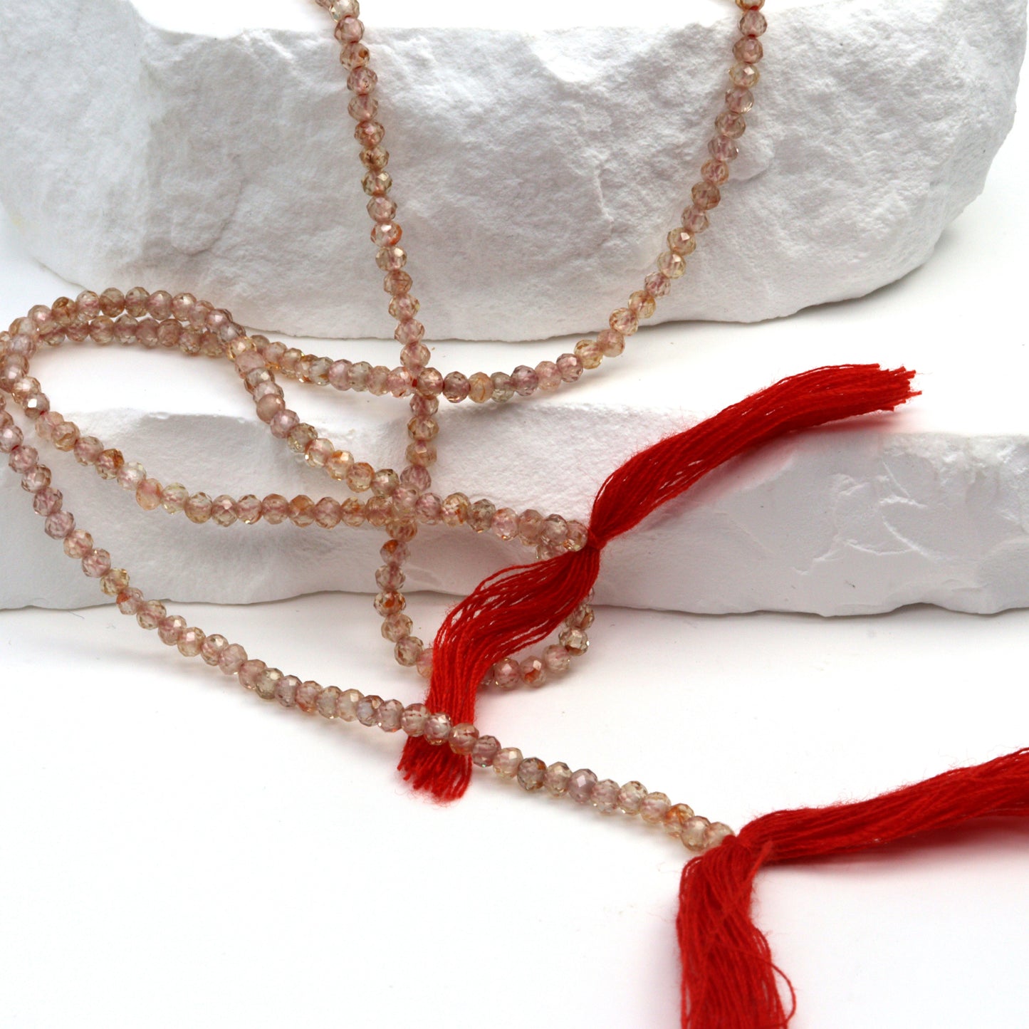 Light Red Zircon 2.5mm Faceted Rounds