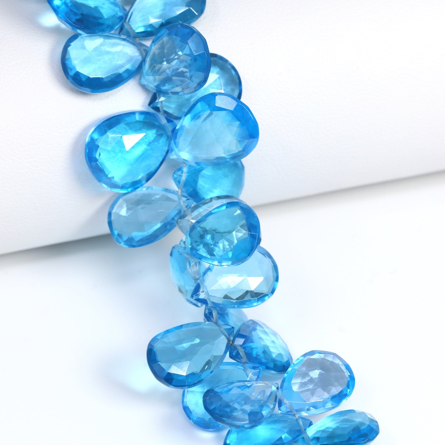 Swiss Blue Topaz 13X10MM – 15X11mm Faceted Pear Briolettes Bead Strand