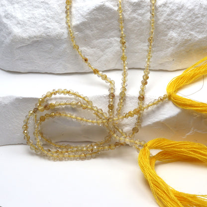 Golden Rutilated Quartz 2mm Faceted Rounds