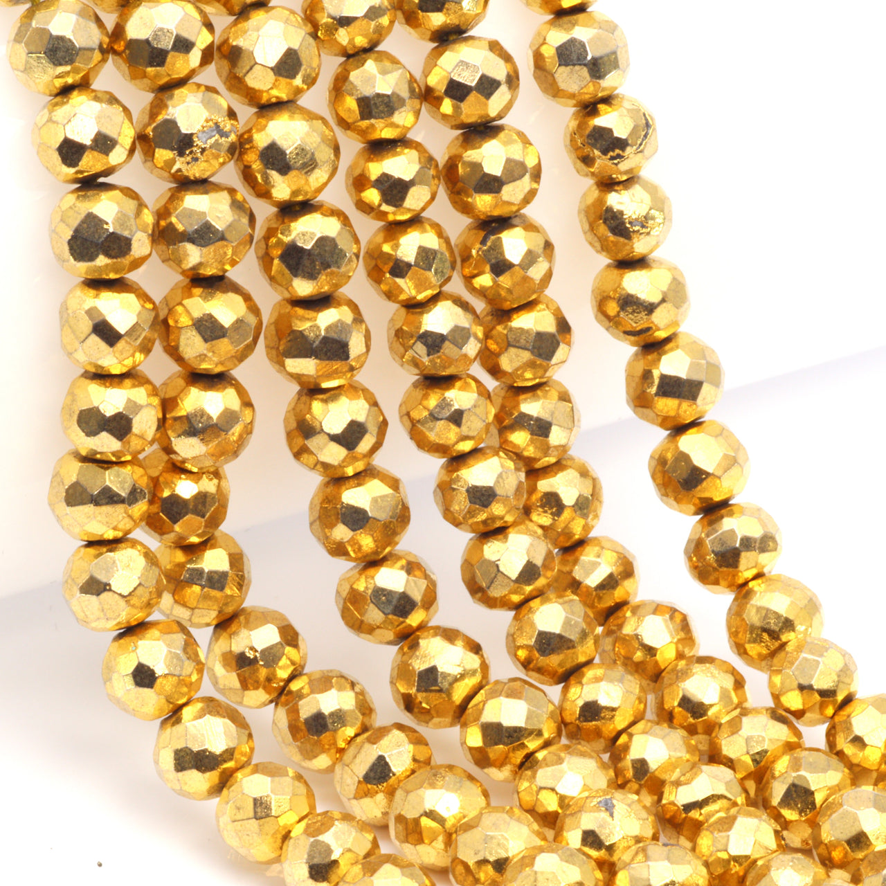 Gold Plated Pyrite 6mm Faceted Rounds