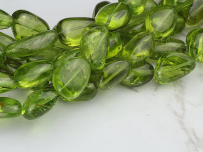 AA Green Peridot 10x8mm - 14x10mm Smooth Nuggets Bead Strand