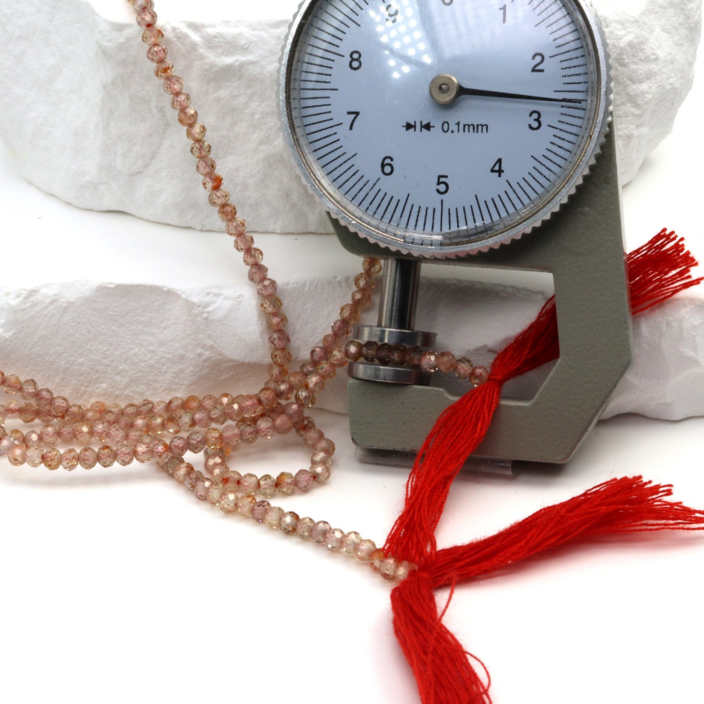 Light Red Zircon 2.5mm Faceted Rounds