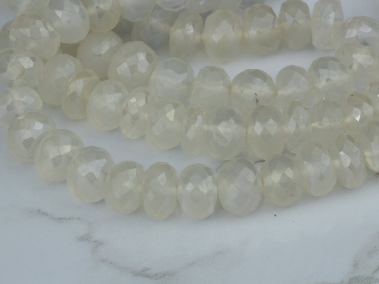 Coated White Chalcedony 7mm Faceted Rondelles