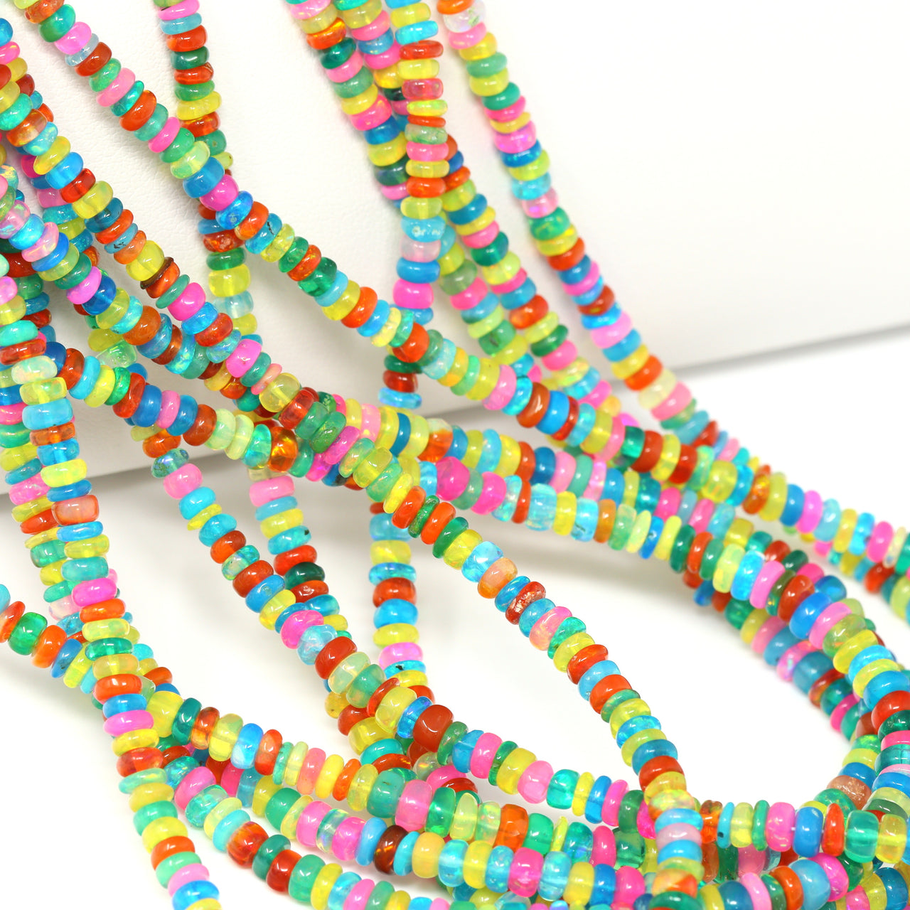Rainbow Ethiopian Opal 3mm – 4mm Smooth Rondelles Bead Strand