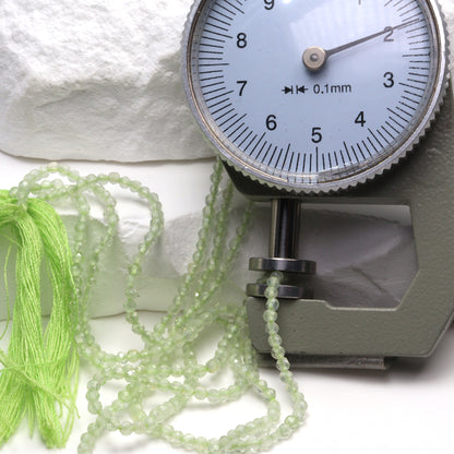 Green Prehnite 2mm Faceted Rounds