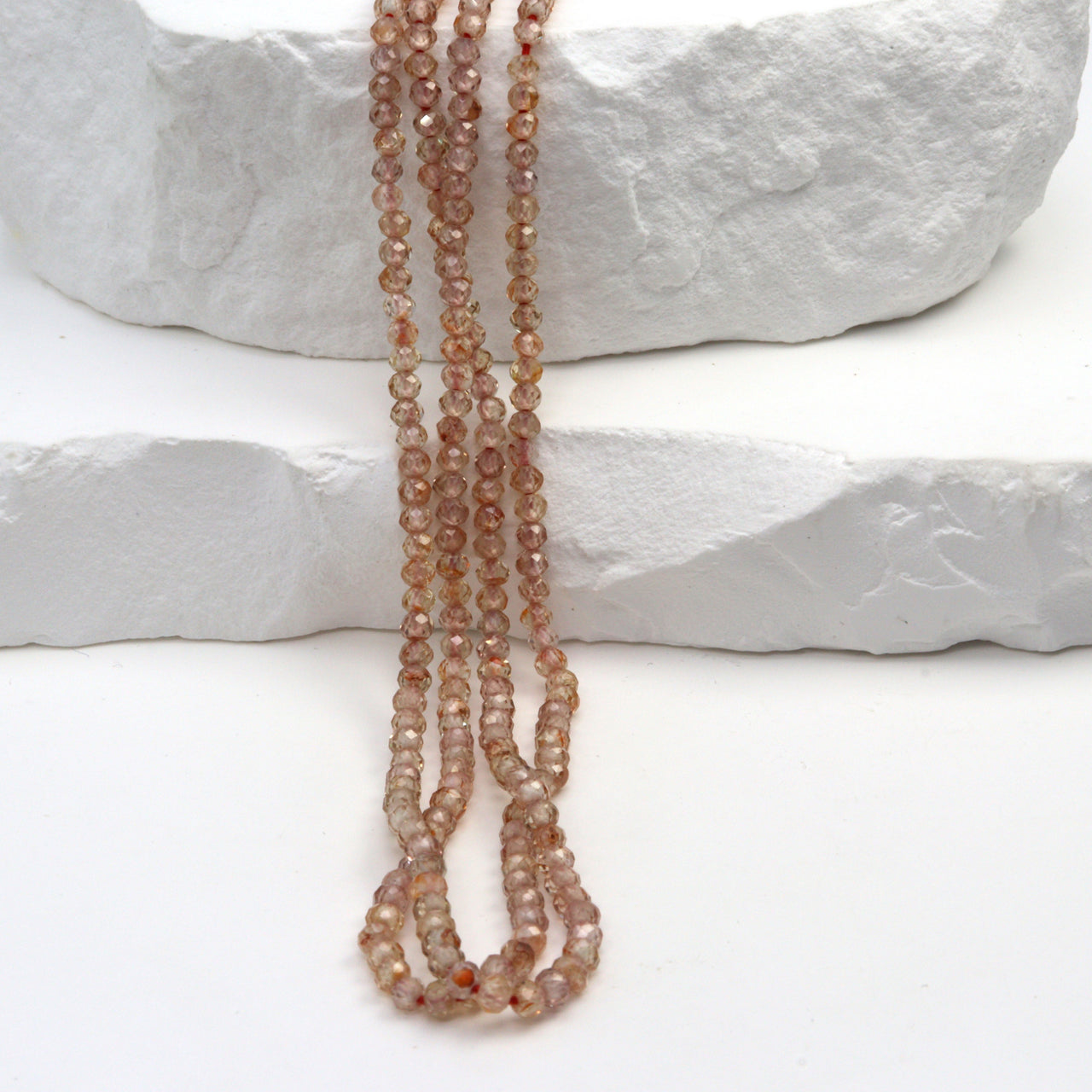 Light Red Zircon 2.5mm Faceted Rounds